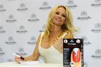 Pamela Anderson  Presents Striplac Nail Polish at Beauty Fair Düsseldorf  March 15, 2013 