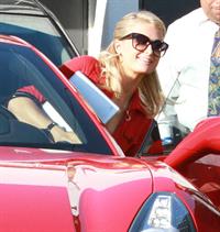 Paris Hilton and River Viiperi leave a shopping trip where Paris gets into her red Ferrari February 13, 2013 