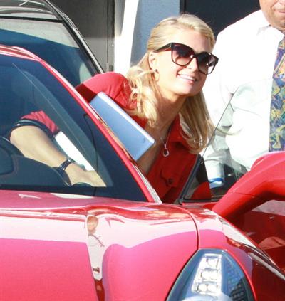 Paris Hilton and River Viiperi leave a shopping trip where Paris gets into her red Ferrari February 13, 2013 
