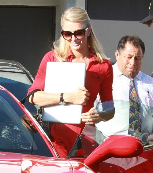 Paris Hilton and River Viiperi leave a shopping trip where Paris gets into her red Ferrari February 13, 2013 