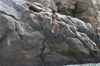 Nina Dobrev in a bikini