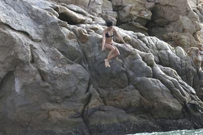 Nina Dobrev in a bikini