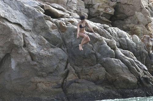 Nina Dobrev in a bikini