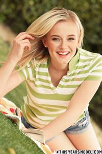 Ellie Jane naked reading in the park.