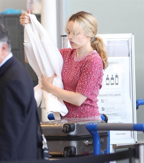 Rachel McAdams - Departs on a flight at LAX airport - August 9, 2012