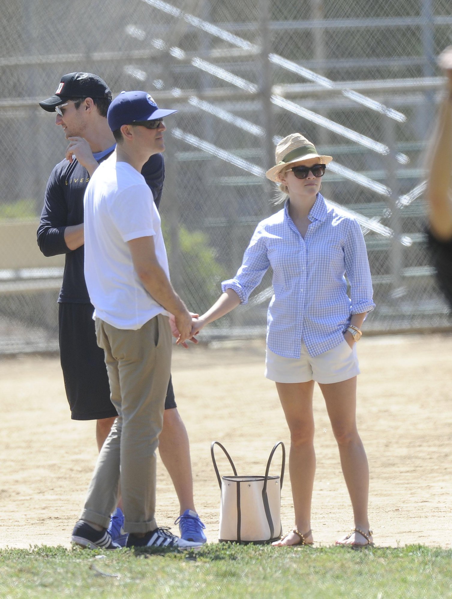 Reese Witherspoon Pictures Reese Witherspoon Plays football with husband in Los Angeles (May 11, 2013)
