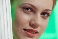 Sexy redhead Shirley Tate shows off her pussy