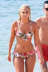 Tulisa Contostavlos in a bikini on the beach in Honolulu July 31, 2012