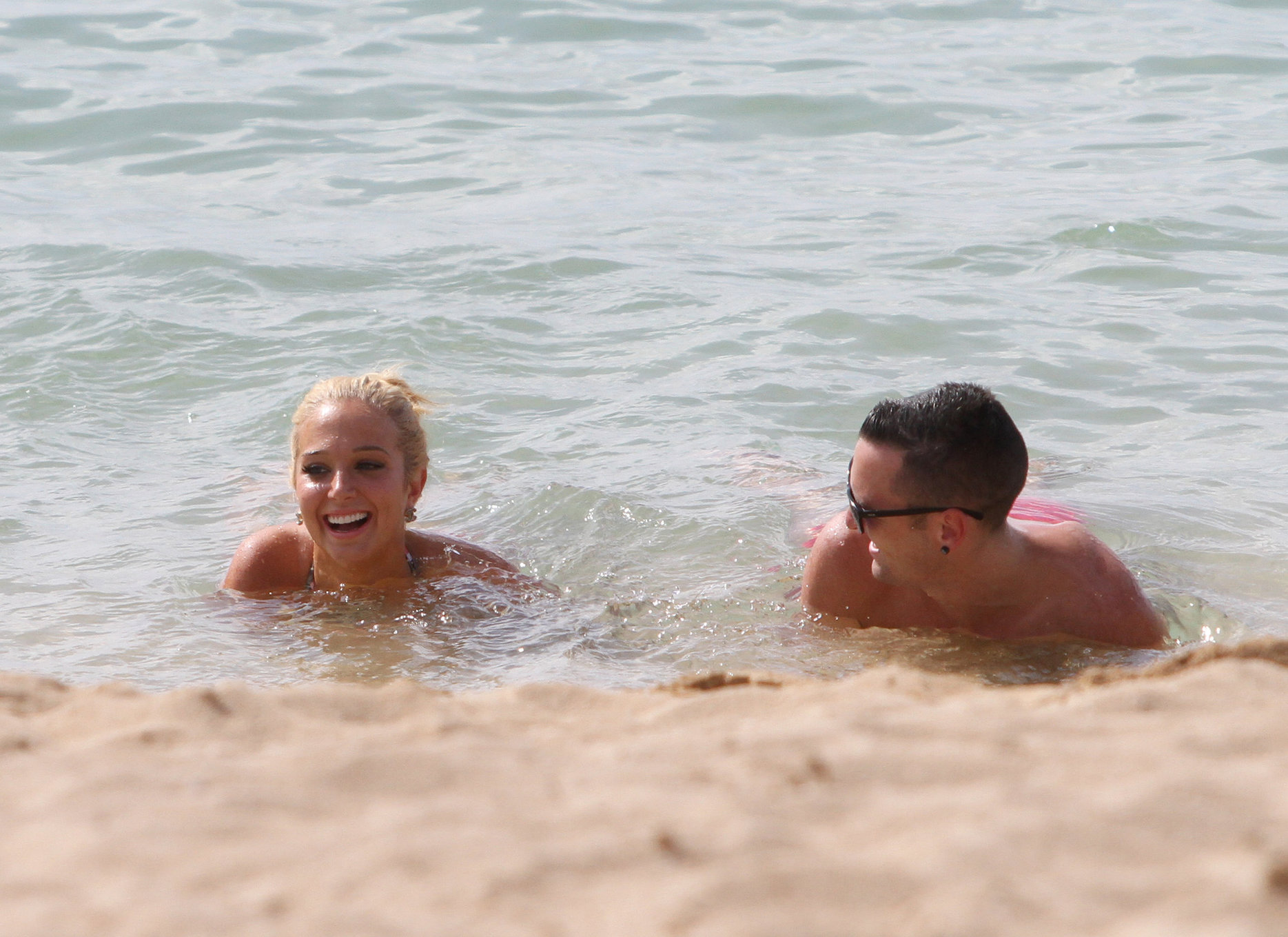 Tulisa Contostavlos Bikini Pictures Tulisa Contostavlos in a bikini on the beach in Honolulu July 31, 2012