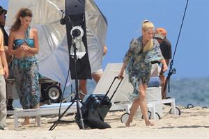 Minka Kelly and Rachael Taylor film Charlie's Angels on a beach in Miami 02-09-11