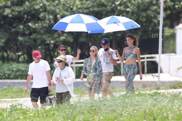 Minka Kelly and Rachael Taylor film Charlie's Angels on a beach in Miami 02-09-11