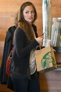 Minka Kelly outside her hotel with her morning Starbucks in New York City 8/2/2012 
