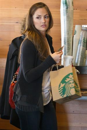 Minka Kelly outside her hotel with her morning Starbucks in New York City 8/2/2012 