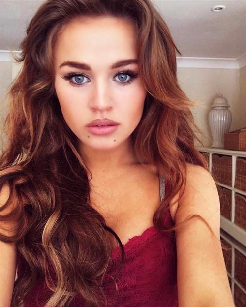 Rosie Mac in lingerie taking a selfie
