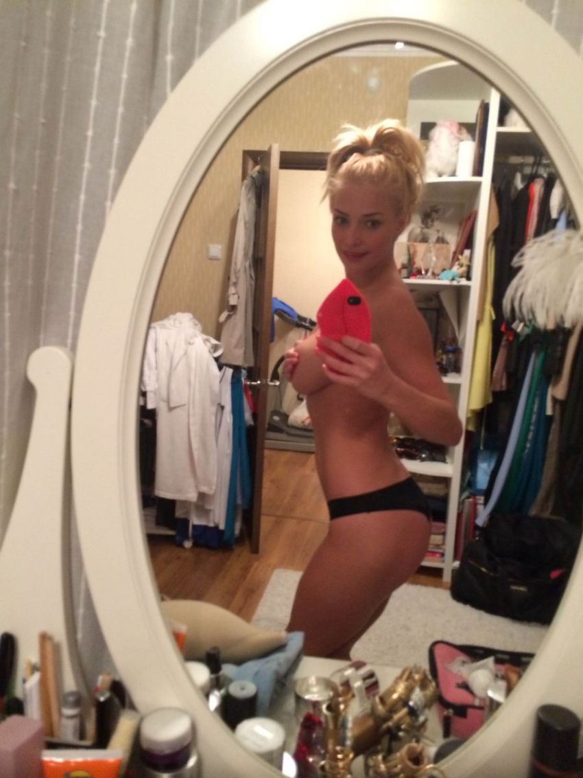 Tatyana Kotova in a bikini taking a selfie