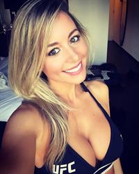 Carly Baker in a bikini taking a selfie