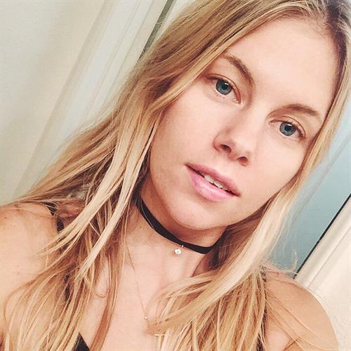 Chrissy Blair in a bikini taking a selfie