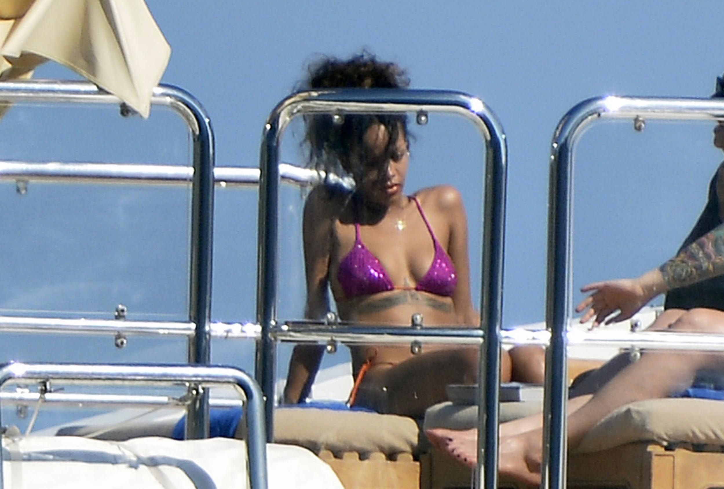Rihanna enjoying a break on a yacht in Ponza August 29, 2014