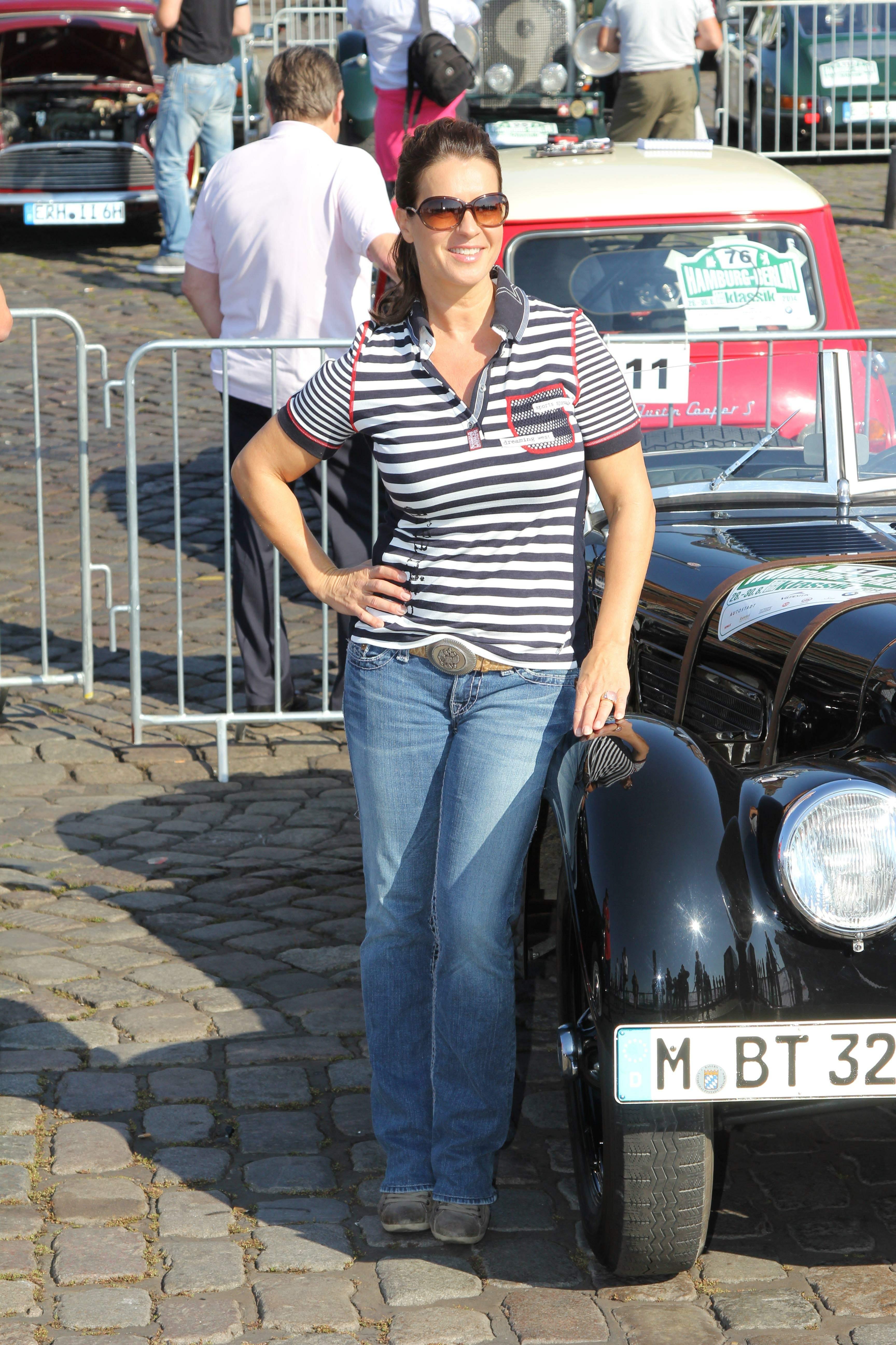 Katarina Witt at the oldtimer car rally Hamburg-Berlin-Klassik August 30, 2014