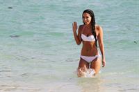 Tulisa Contostavlos in a bikini on the beach in Bermuda August 21, 2014