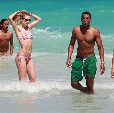 Doutzen Kroes enjoys a day on the beach in Miami Beach, FL on April 28, 2013