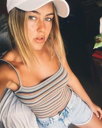 Stephanie Claire Smith in a bikini taking a selfie