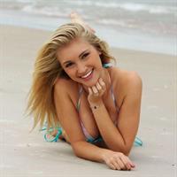 Anna Faith Carlson in a bikini taking a selfie