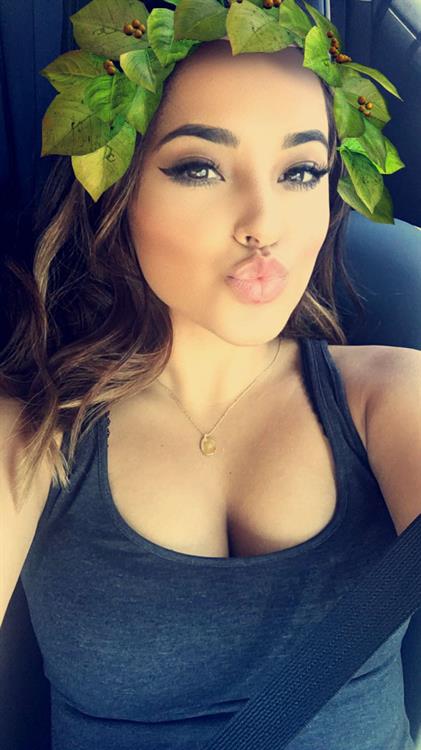 Becky G taking a selfie