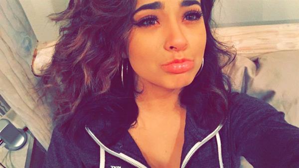 Becky G taking a selfie