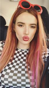 Bella Thorne taking a selfie