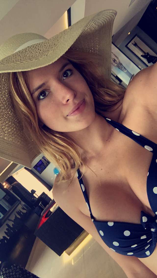 Bella Thorne in a bikini taking a selfie
