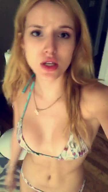 Bella Thorne in a bikini taking a selfie