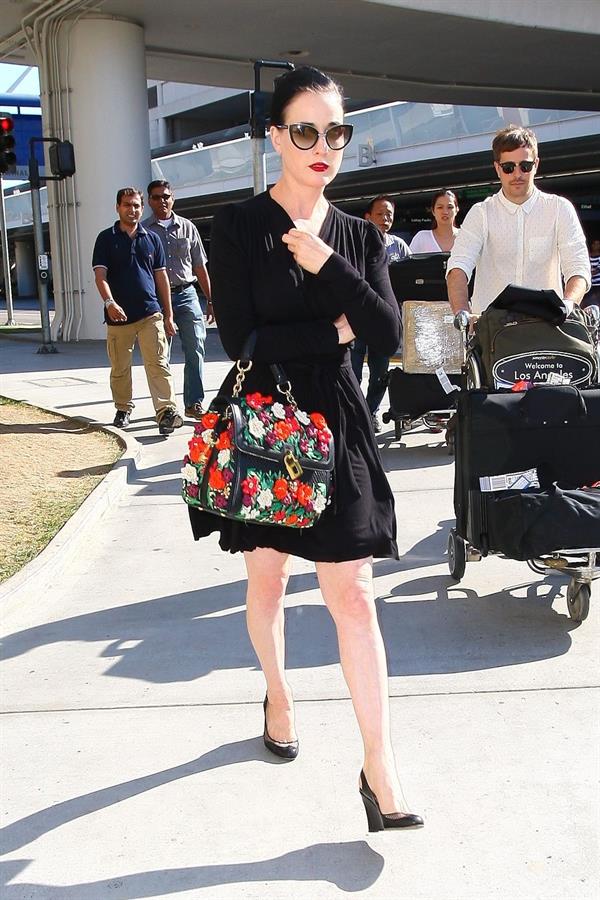 Dita Von Teese arrives from a flight at LAX August 20, 2014