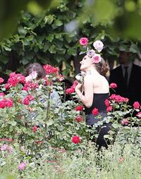 Natalie Portman modeling for a Miss Dior campaign photo shoot in the gardens of the Palais Royal in Paris 6/26/12 