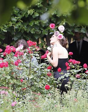 Natalie Portman modeling for a Miss Dior campaign photo shoot in the gardens of the Palais Royal in Paris 6/26/12 