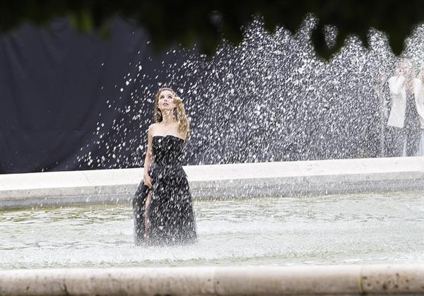 Natalie Portman modeling for a Miss Dior campaign photo shoot in the gardens of the Palais Royal in Paris 6/26/12 