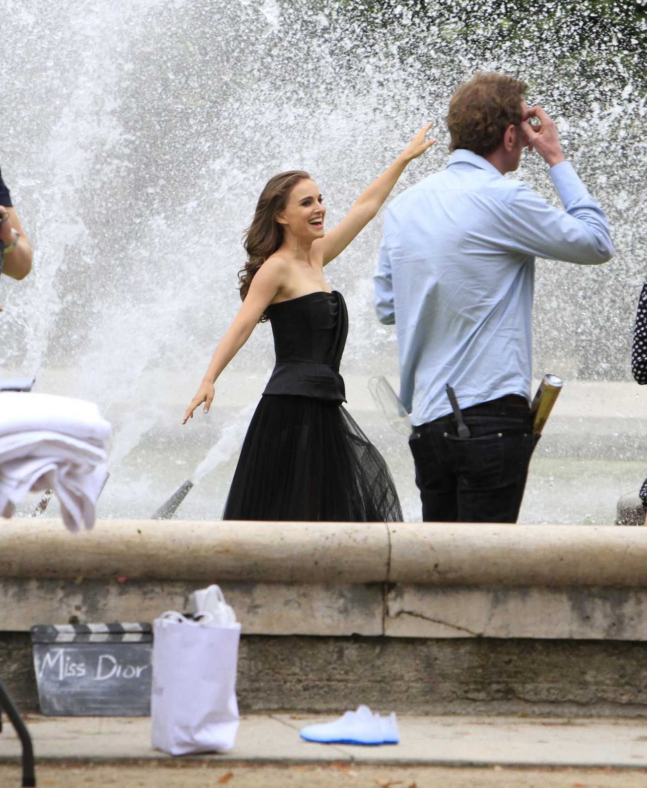 Natalie Portman modeling for a Miss Dior campaign photo shoot in the gardens of the Palais Royal in Paris 6/26/12 