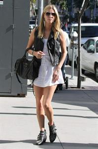 Nicky Hilton in a short white dress while shopping in Beverly Hills March 1, 2013 