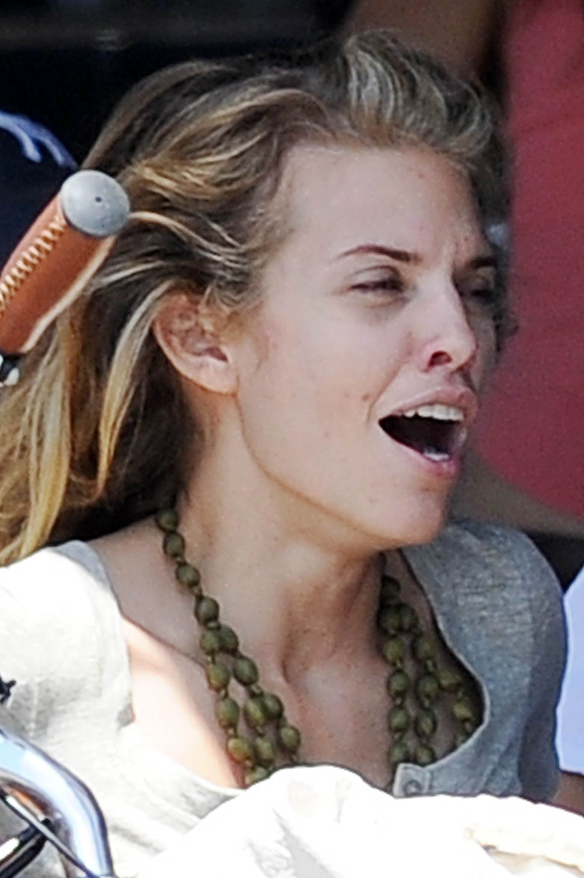 AnnaLynne McCords dress blew up to reveal her underwear in Venice, August 20, 2014