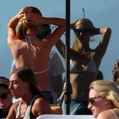 Paris Hilton a party on the beach in Malibu July 27, 2013