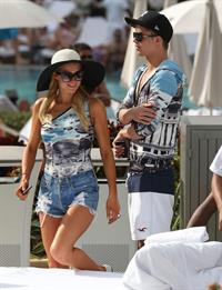 Paris Hilton spends the day in and out of the pool in Miami December 8, 2012