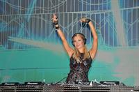 Paris Hilton walks for designer duo Shane and Falguni Peacock and performs as a DJ at the India Resort Fashion Week