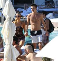 Paris Hilton poolside at their Miami hotel December 7-2012 