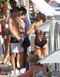 Paris Hilton poolside at their Miami hotel December 7-2012 