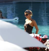 Paris Hilton poolside at their Miami hotel December 7-2012 