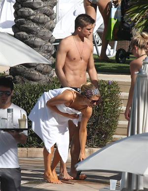 Paris Hilton poolside at their Miami hotel December 7-2012 