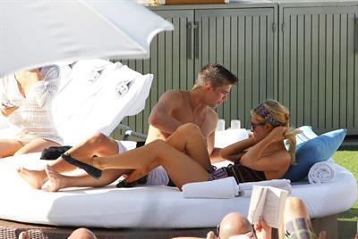 Paris Hilton poolside at their Miami hotel December 7-2012 