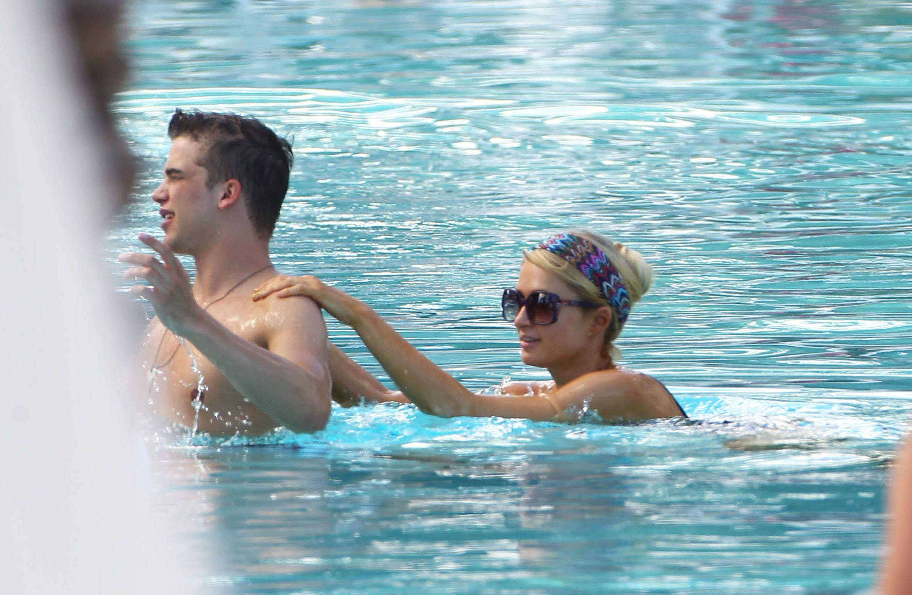 Paris Hilton poolside at their Miami hotel December 7-2012 