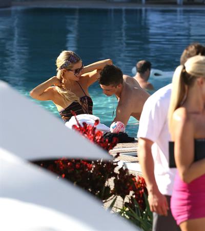 Paris Hilton poolside at their Miami hotel December 7-2012 
