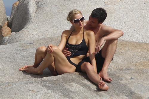 Paris Hilton - Wearing a swimsuit at a beach in France August 6, 2012